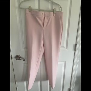 Pale pink dressy pants.